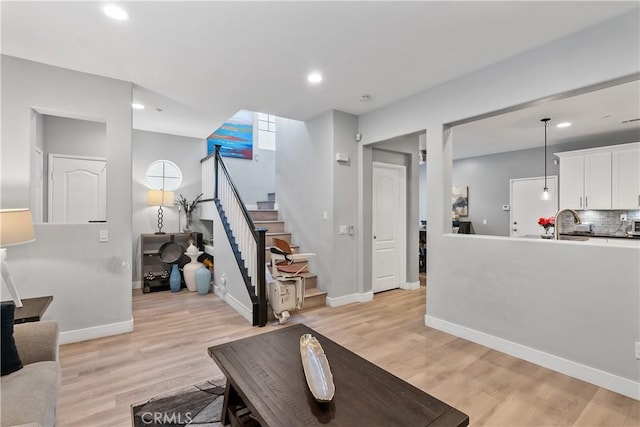 39 Windward Way, Buena Park, CA 90621 - living room with stairs, recessed lighting, and light wood-style flooring