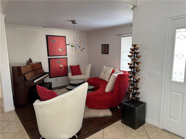20159 Majestic Dr, Apple Valley, CA 92308 - living area featuring tile patterned flooring, ornamental molding, and baseboards