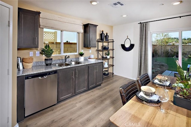 8504 Peachwillow Ct, Jurupa Valley, CA 92509 - kitchen with stainless steel dishwasher, a sink, light wood-type flooring, dark brown cabinetry, and recessed lighting