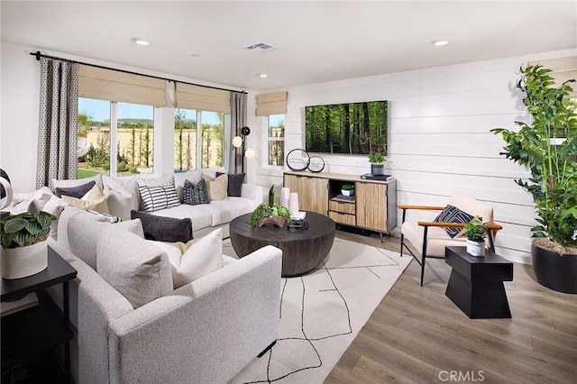 8504 Peachwillow Ct, Jurupa Valley, CA 92509 - living room featuring healthy amount of natural light, light wood-style flooring, and recessed lighting