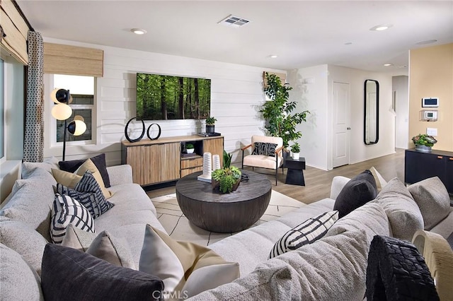 8504 Peachwillow Ct, Jurupa Valley, CA 92509 - living room with radiator heating unit, recessed lighting, light wood-style flooring, and baseboards