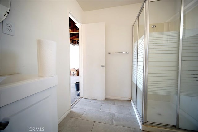 61740 Oleander Dr, Joshua Tree, CA 92252 - hallway with light tile patterned floors and healthy amount of natural light