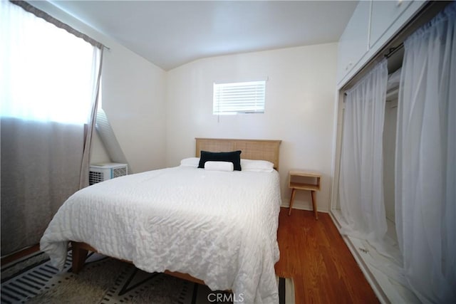 61740 Oleander Dr, Joshua Tree, CA 92252 - bedroom featuring wood finished floors and vaulted ceiling