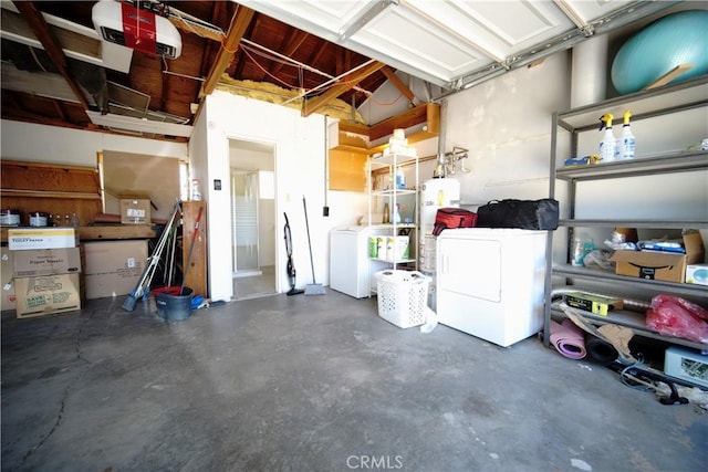 61740 Oleander Dr, Joshua Tree, CA 92252 - garage featuring a garage door opener and washing machine and dryer