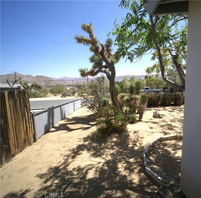 61740 Oleander Dr, Joshua Tree, CA 92252 - view of yard with a mountain view