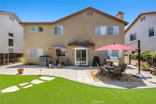 33370 Morning View Dr, Temecula, CA 92592 - rear view of property featuring stucco siding, a patio, a chimney, and a tiled roof