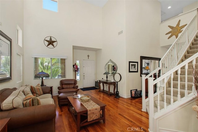 33370 Morning View Dr, Temecula, CA 92592 - living room with a high ceiling, wood finished floors, and stairway