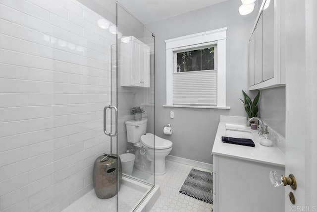 3818 Herbert St, San Diego, CA 92103 - bathroom featuring vanity, toilet, a shower stall, and baseboards