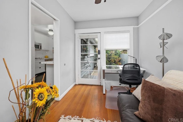 3818 Herbert St, San Diego, CA 92103 - home office with light wood-type flooring, baseboards, and ceiling fan