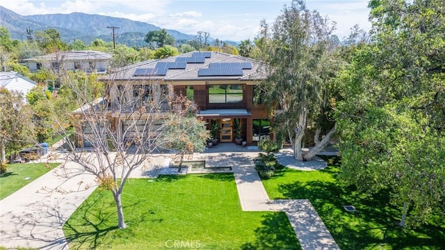 1410 Santa Margarita Dr, Arcadia, CA 91006 - view of front facade featuring a front lawn, a mountain view, solar panels, a porch, and driveway