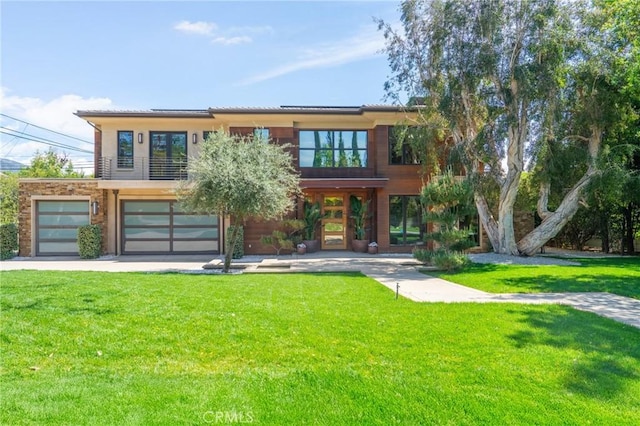 1410 Santa Margarita Dr, Arcadia, CA 91006 - view of front facade featuring solar panels, a front lawn, a balcony, and a garage