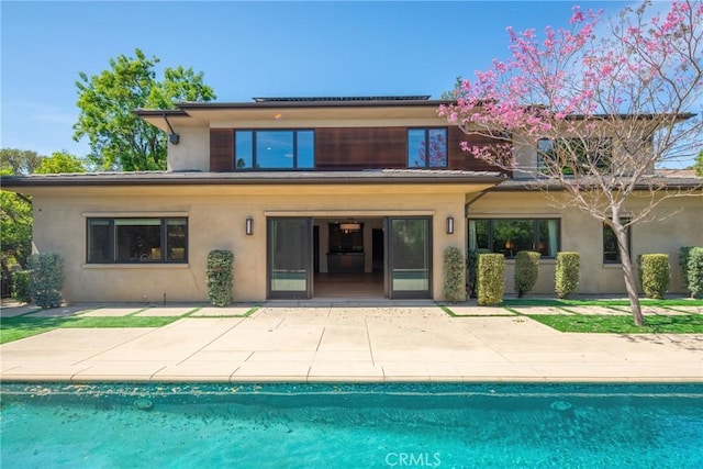 1410 Santa Margarita Dr, Arcadia, CA 91006 - back of property with a patio, stucco siding, and an outdoor pool