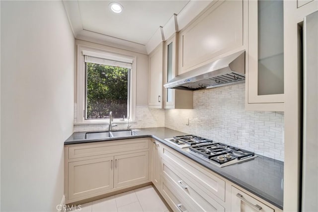 1410 Santa Margarita Dr, Arcadia, CA 91006 - kitchen with stainless steel gas cooktop, range hood, decorative backsplash, crown molding, and light tile patterned flooring