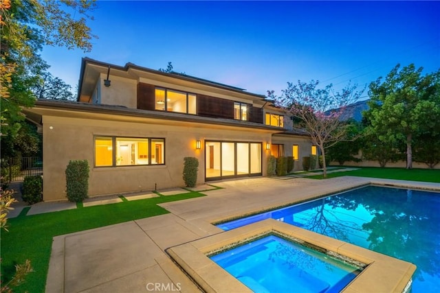 1410 Santa Margarita Dr, Arcadia, CA 91006 - back of property with an in-ground hot tub, a patio, stucco siding, and an outdoor pool