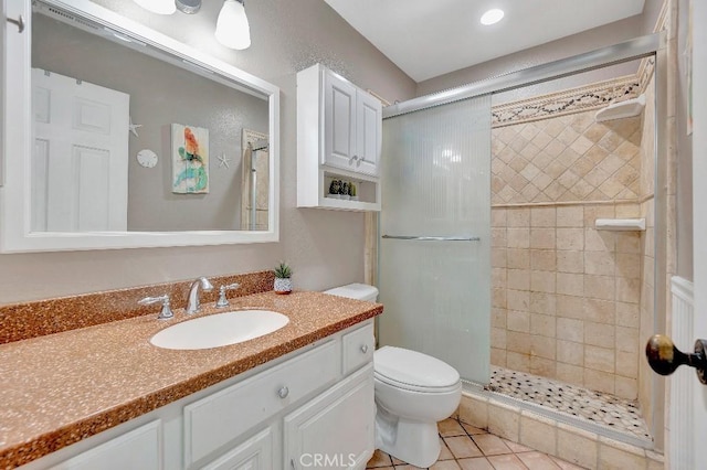 15414 Ficus St, Chino Hills, CA 91709 - full bathroom featuring a stall shower, vanity, toilet, and tile patterned floors