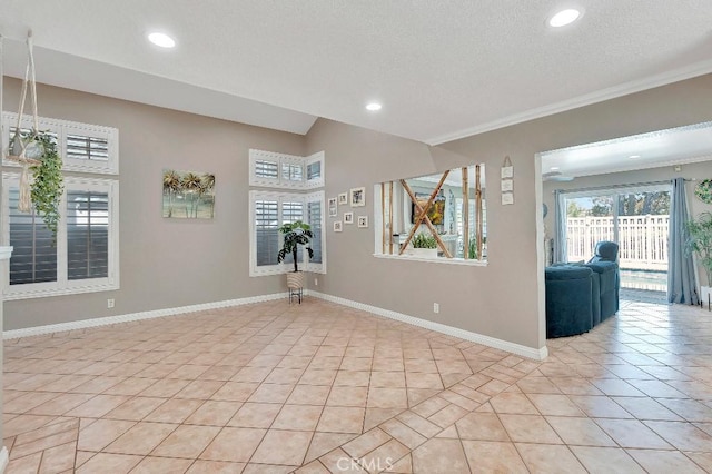 15414 Ficus St, Chino Hills, CA 91709 - spare room with light tile patterned floors, baseboards, crown molding, recessed lighting, and a textured ceiling