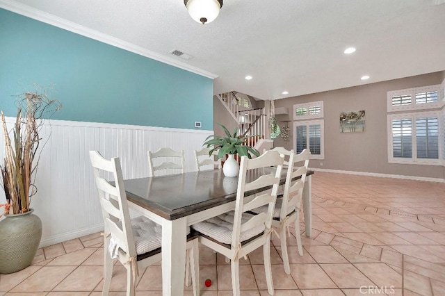 15414 Ficus St, Chino Hills, CA 91709 - dining room with crown molding, light tile patterned floors, recessed lighting, stairs, and wainscoting