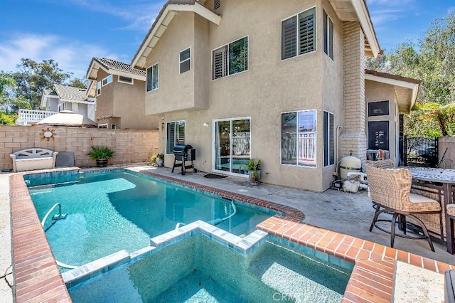 15414 Ficus St, Chino Hills, CA 91709 - view of pool with a pool with connected hot tub, a patio, a fenced backyard, and grilling area