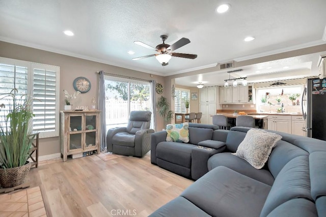 15414 Ficus St, Chino Hills, CA 91709 - living room with crown molding, a ceiling fan, recessed lighting, light wood finished floors, and baseboards