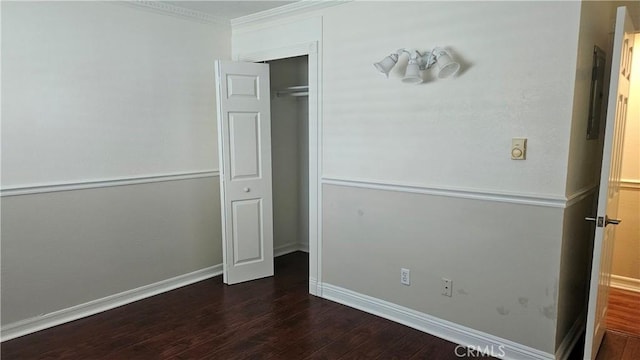 22947 Nadine Cir Unit A, Torrance, CA 90505 - unfurnished bedroom with dark wood-style floors, a closet, and ornamental molding