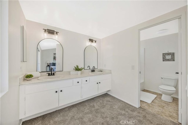 23326 Elfin Pl, Moreno Valley, CA 92557 - bathroom featuring double vanity, carpet floors, and a tub