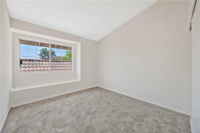 23326 Elfin Pl, Moreno Valley, CA 92557 - spare room featuring carpet floors and lofted ceiling