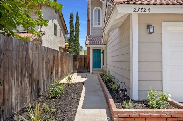 23326 Elfin Pl, Moreno Valley, CA 92557 - entrance to property with a tiled roof