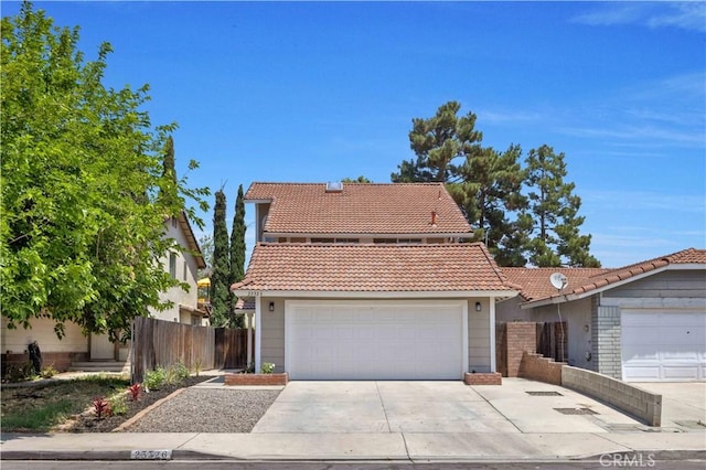 23326 Elfin Pl, Moreno Valley, CA 92557 - view of front of house featuring a tiled roof and driveway