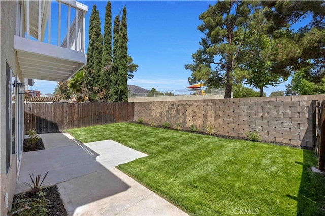 23326 Elfin Pl, Moreno Valley, CA 92557 - fenced backyard featuring a patio