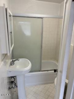 505 S Rowan Ave, Los Angeles, CA 90063 - full bath featuring shower / bath combination with glass door and tile patterned flooring