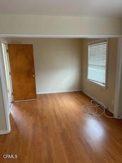 505 S Rowan Ave, Los Angeles, CA 90063 - unfurnished room with wood finished floors
