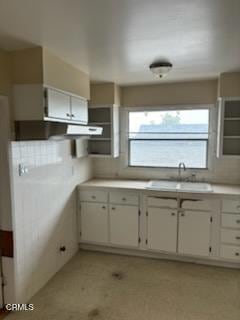 505 S Rowan Ave, Los Angeles, CA 90063 - kitchen featuring light countertops and decorative backsplash
