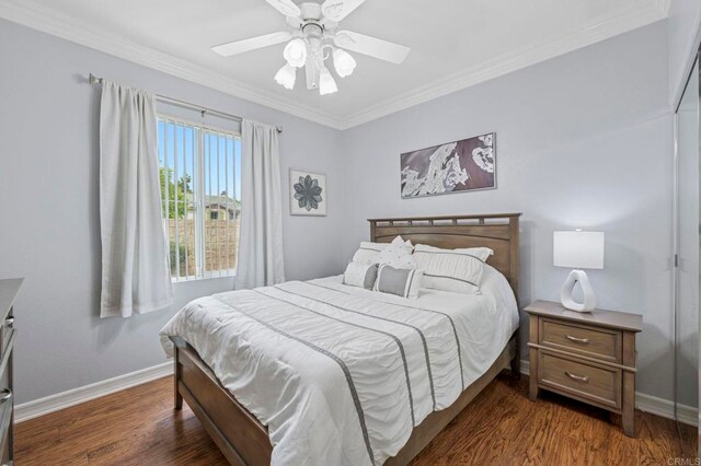 31920 Pasos Pl, Temecula, CA 92591 - bedroom with crown molding, dark wood-style floors, and a ceiling fan