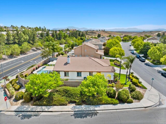 31920 Pasos Pl, Temecula, CA 92591 - aerial perspective of suburban area featuring a mountainous background