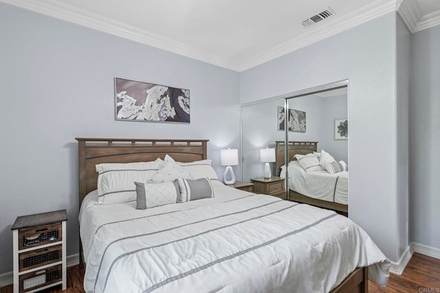 31920 Pasos Pl, Temecula, CA 92591 - bedroom with ornamental molding, wood finished floors, and a closet