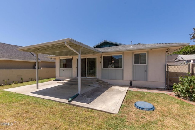 4190 Ojai Rd, Santa Paula, CA 93060 - back of property with entry steps, a patio area, board and batten siding, and a shingled roof