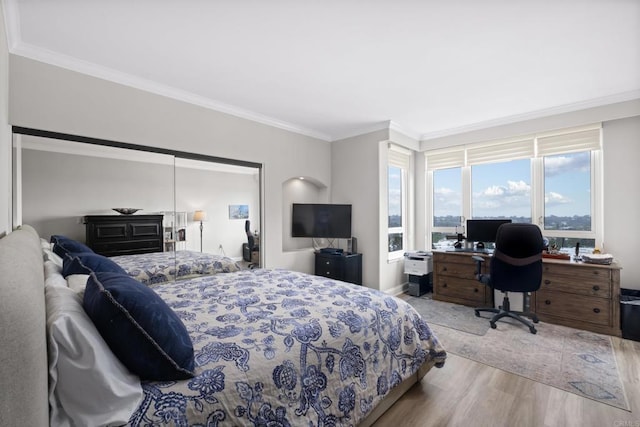 3890 Nobel Dr Unit 1505, San Diego, CA 92122 - bedroom featuring wood finished floors, ornamental molding, and a desk