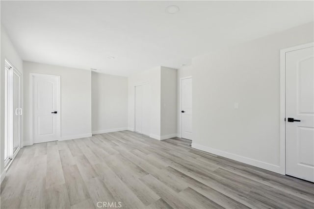44242 Benald St, Lancaster, CA 93535 - spare room featuring light wood-type flooring and baseboards