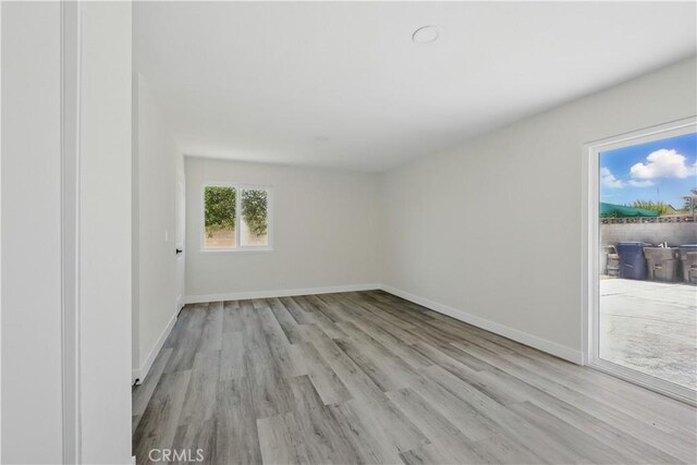 44242 Benald St, Lancaster, CA 93535 - empty room with wood finished floors and baseboards