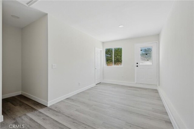 44242 Benald St, Lancaster, CA 93535 - spare room featuring light wood-style floors and baseboards
