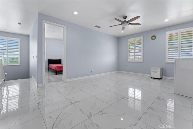 1600 Liv Ct, Redlands, CA 92374 - empty room with a ceiling fan, light marble finish floors, baseboards, and recessed lighting