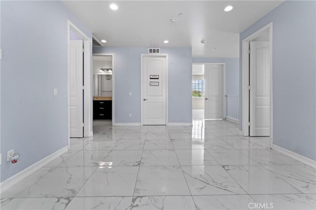 1600 Liv Ct, Redlands, CA 92374 - empty room with recessed lighting, baseboards, and light marble finish floors
