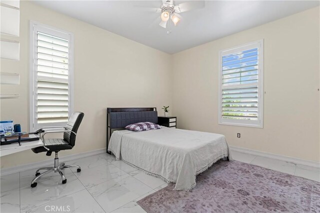 1600 Liv Ct, Redlands, CA 92374 - bedroom with marble look tile flooring, baseboards, an office area, and a ceiling fan