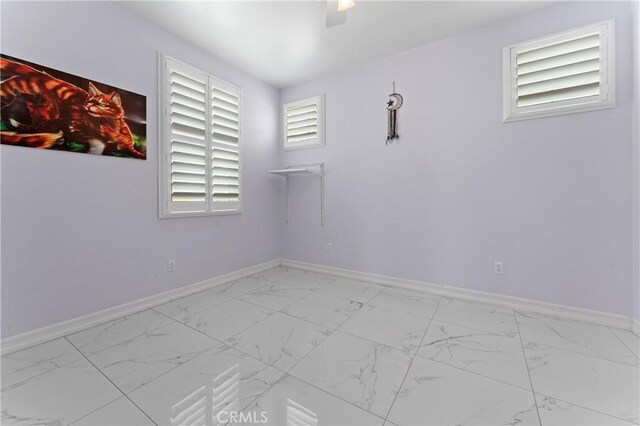 1600 Liv Ct, Redlands, CA 92374 - empty room featuring marble finish flooring and baseboards