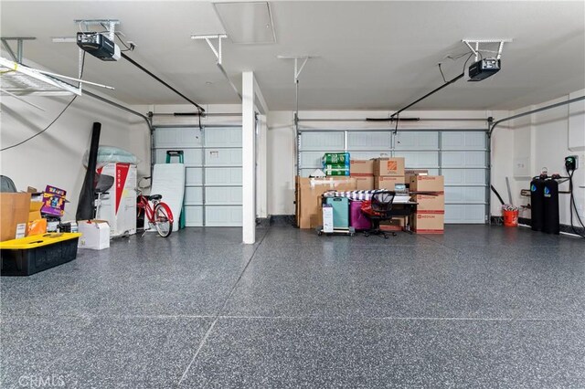 1600 Liv Ct, Redlands, CA 92374 - garage featuring a garage door opener
