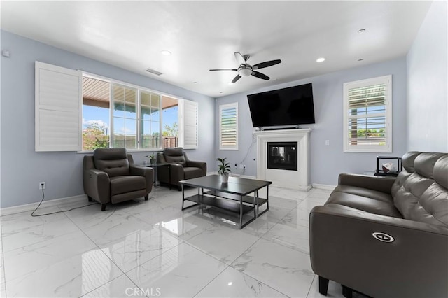 1600 Liv Ct, Redlands, CA 92374 - living area with ceiling fan, baseboards, recessed lighting, a high end fireplace, and plenty of natural light