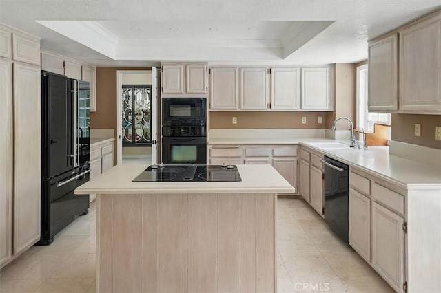 25009 Wintergreen Ct, Stevenson Ranch, CA 91381 - kitchen with black appliances, a sink, a raised ceiling, light tile patterned floors, and crown molding
