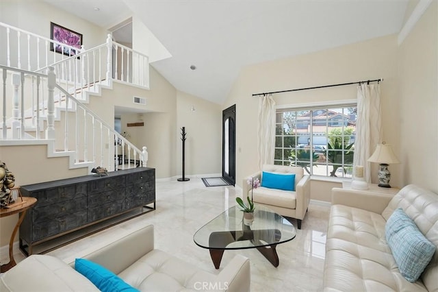 25009 Wintergreen Ct, Stevenson Ranch, CA 91381 - living area featuring baseboards, stairway, and high vaulted ceiling