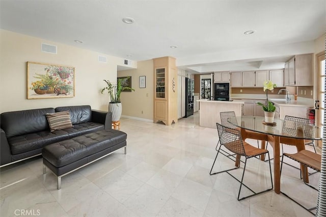 25009 Wintergreen Ct, Stevenson Ranch, CA 91381 - living room with recessed lighting and baseboards