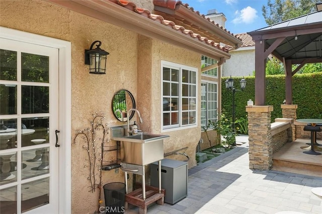 25009 Wintergreen Ct, Stevenson Ranch, CA 91381 - view of patio / terrace featuring a gazebo and a sink